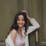 Woman in White Blazer Smiling