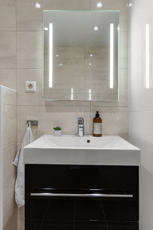Lights Reflection in Bathroom Mirror